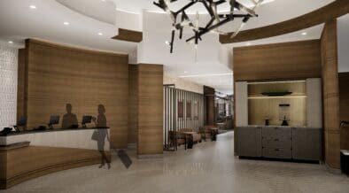 A photo rendering showing the new lobby sitting area and check-in desk at The Grand Hyatt DFW.