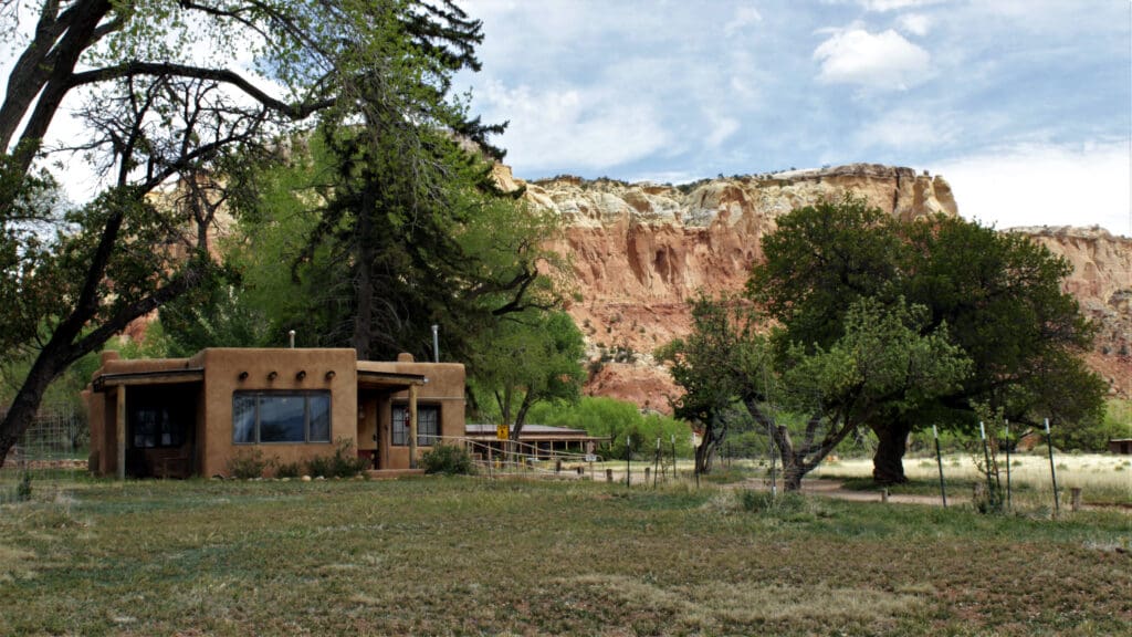 Georgia O'Keeffe Cabin with the mesa in distance, at Ghost Ranch, Abiquiu, New Mexico.