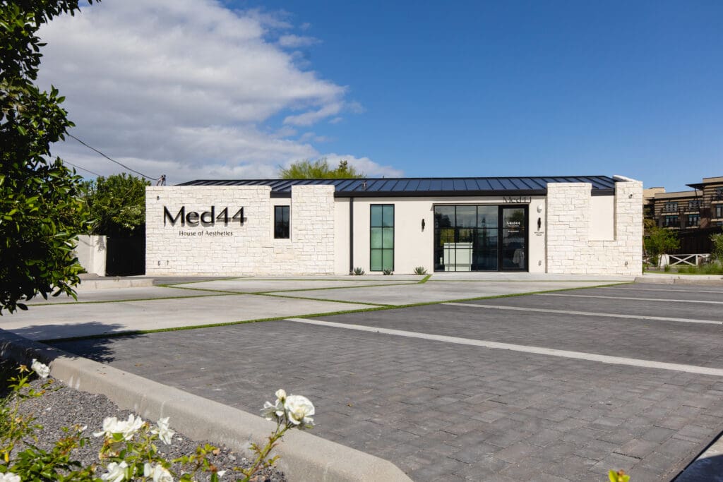 The small brick building housing Med44 and a concrete drive.
