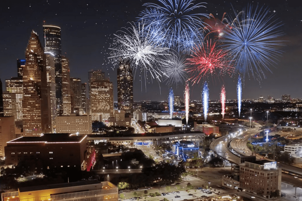 POST Huston rooftop views of Downtown Huston with Fourth of July fireworks.