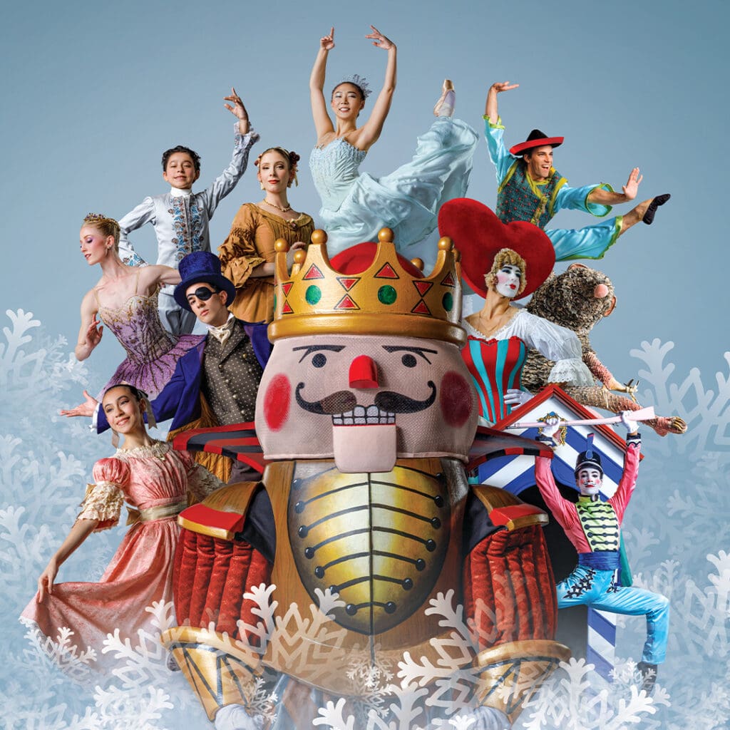 A large nutcracker is surrounded by other beloved characters — Clara, Sugar Plum fairy and others — to depict Ballet Arizona's "The Nutcracker" performance.