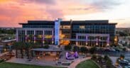 An evening view of GSQ shopping area and City Hall in Goodyear.