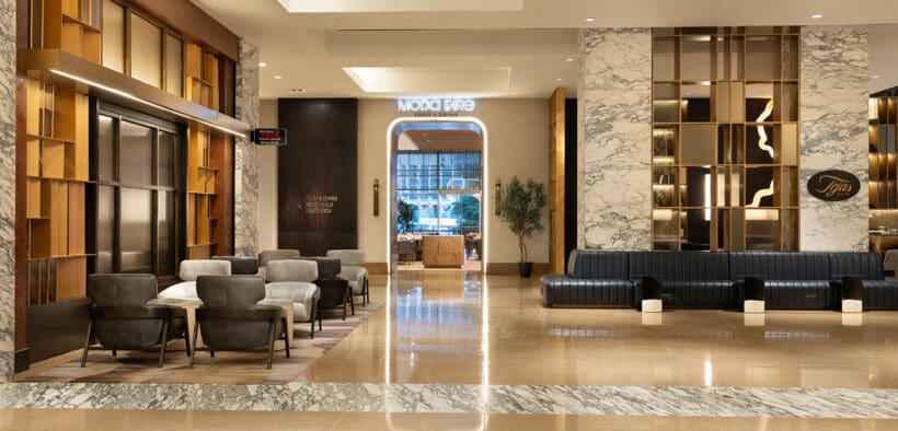 The upgraded lobby of Grand Hyatt San Antonio River Walk with open space and elevated seating and decor.