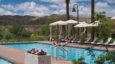 The new Rancho de Los Caballeros with cabanas and mountain views in the background.