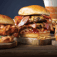 A chicken melt, bacon cheeseburger melt, grilled chees and to-go drink from The Melt at Novus Innovation Corridor.