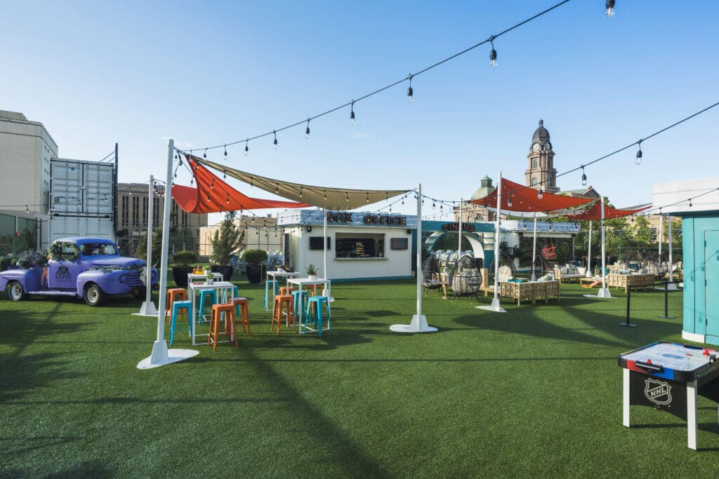A canopy and seating set up on The Worthington Hotel's Terrace for Rooftop Cinema Club.