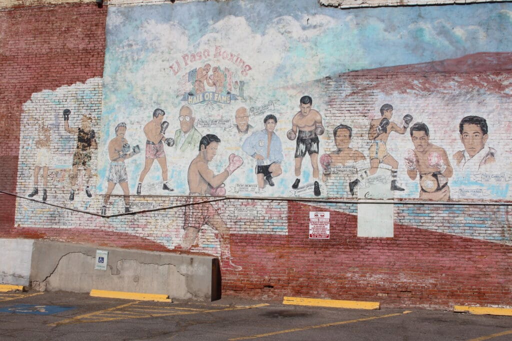 Several boxing legends painted on a brick wall as part of the "Boxing Hall of Fame" mural by Jesus de Mendoza Pano in El Paso.