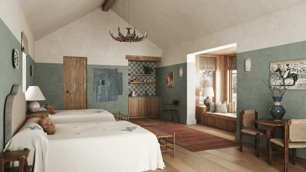 Two-bed casita at Hideaway Round Top with two beds, luggage stands, window seat, chairs and coffee table. 