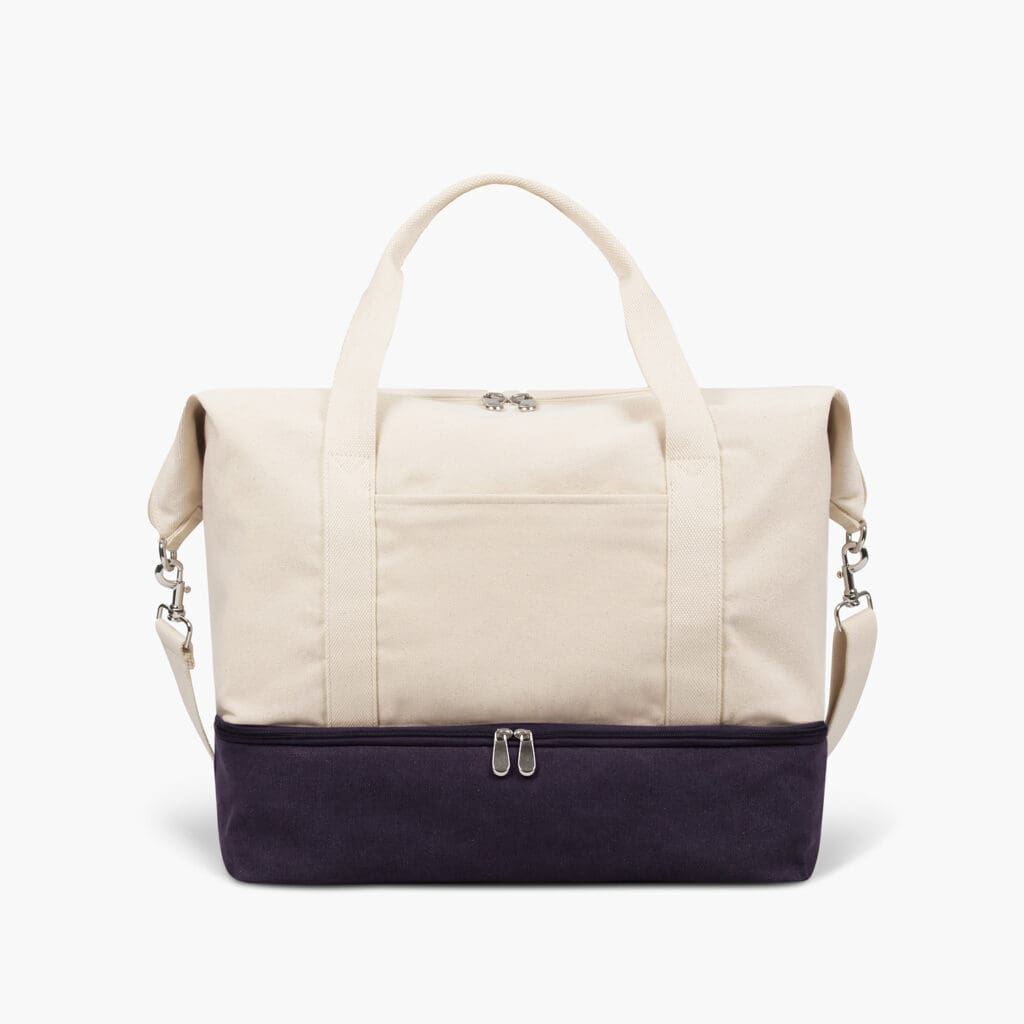 The Deluxe Weekender canvas, multi-zipper bag from Lo & Sons. 