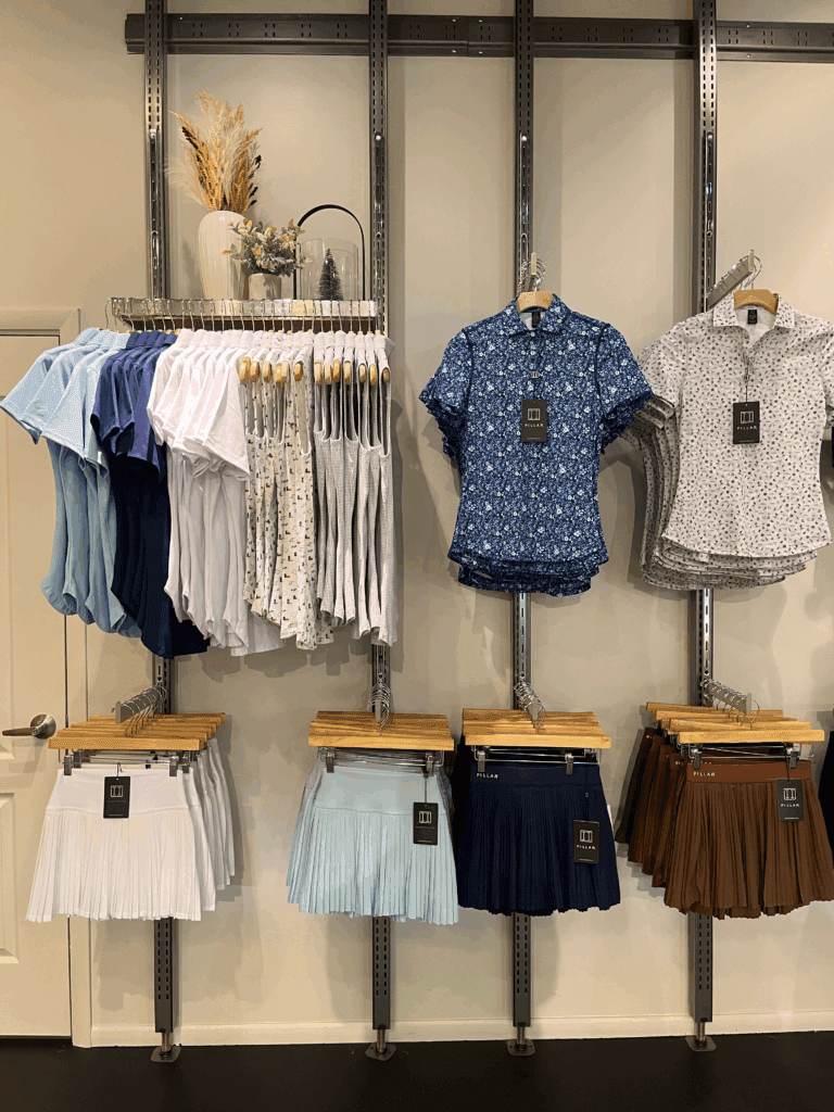 Rows of athleisure polo tops and skirts at Pillar Athletics at the Chandler Fashion Center mall.
