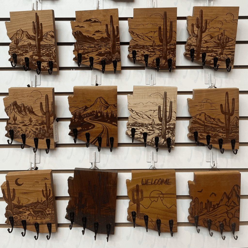 Wood-carved key holder wall hangers at Smoke & Mirrors at Chandler Fashion Center. 