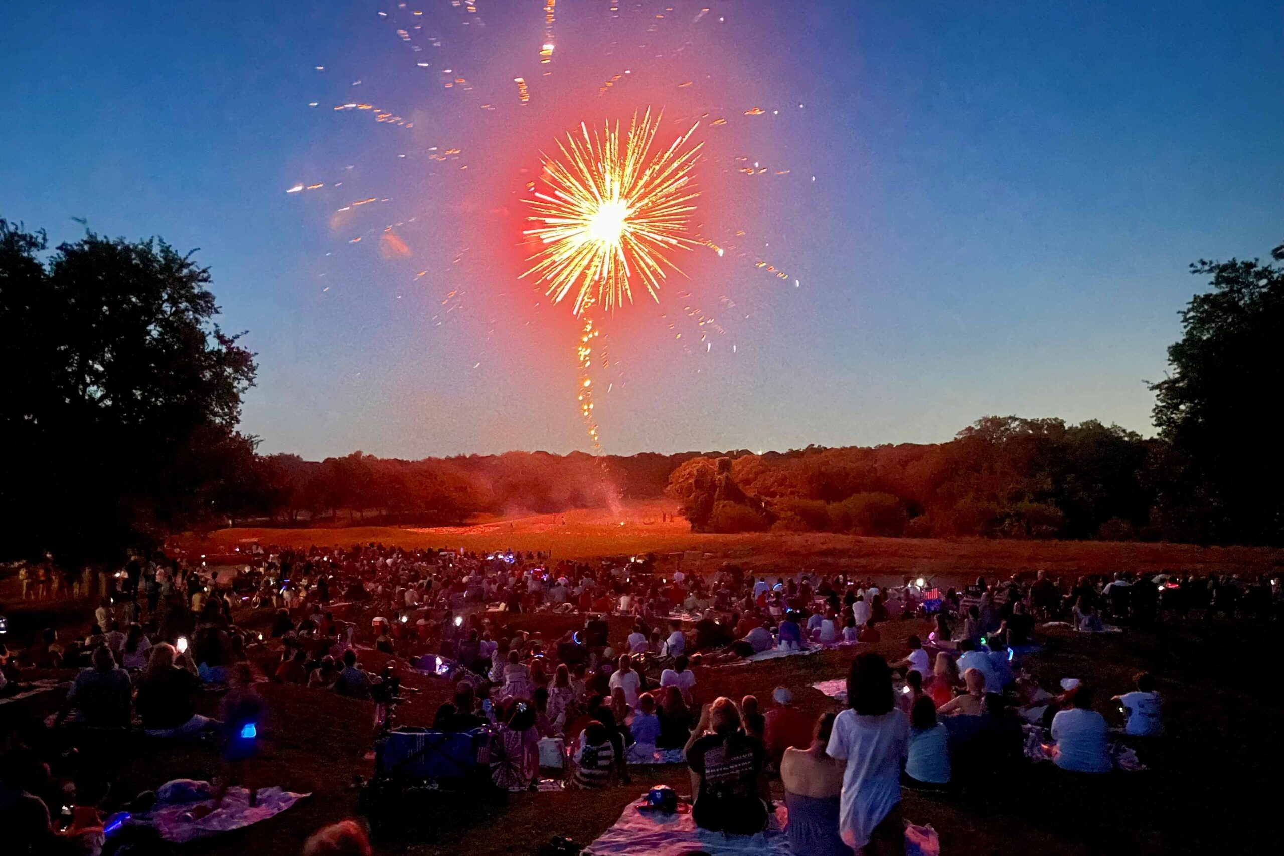 A fireworks display with people watching at Hyatt Regency Hill Country Resort and Villas in Texas.