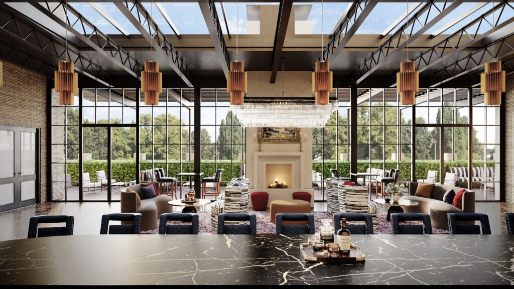 The Faust Hotel's newly renovated bar with floor-to-ceiling windows, ample seating and a fireplace. 