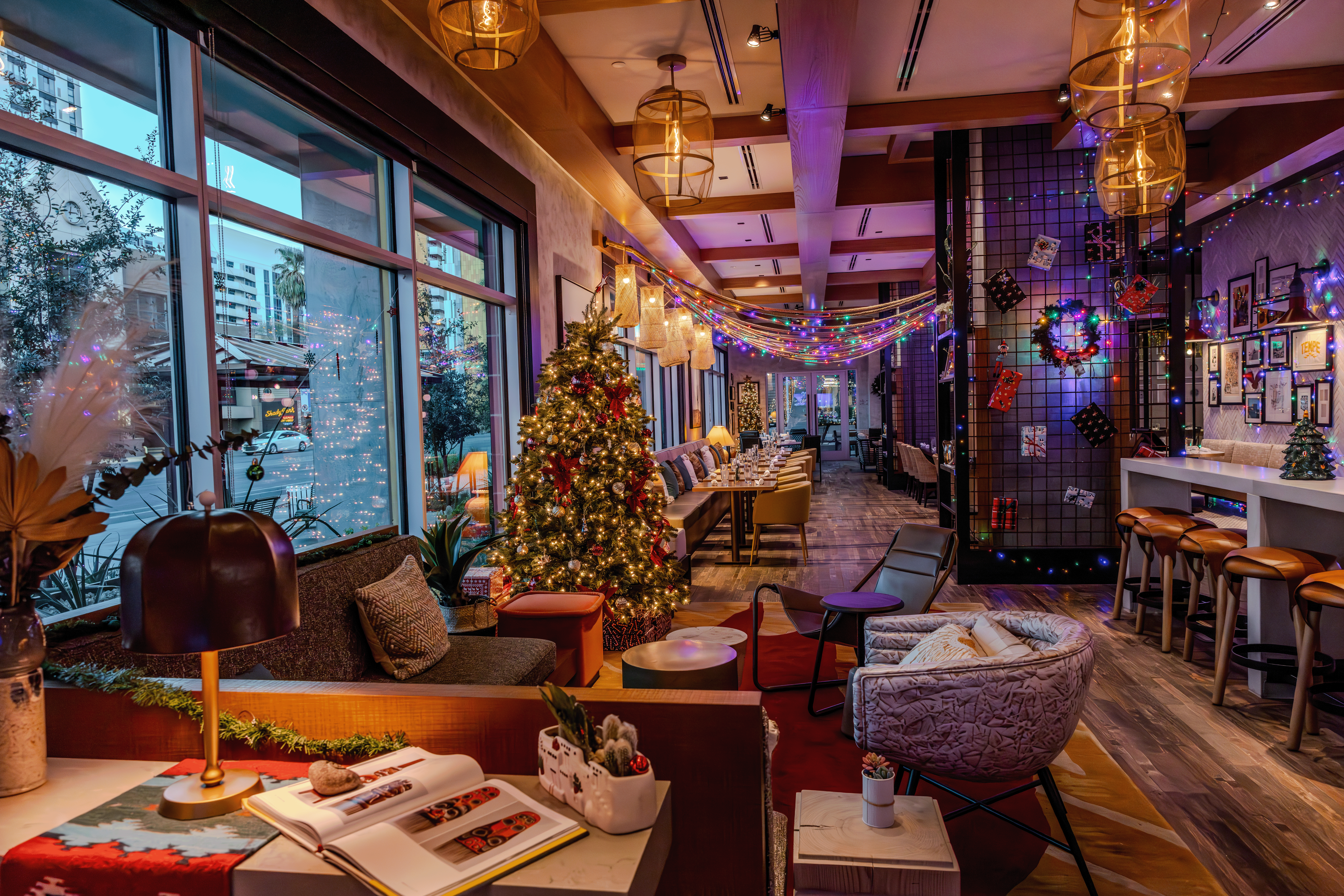 The lobby with Christmas tree and colored lights and holiday decor at Omni Tempe Hotel at ASU .
