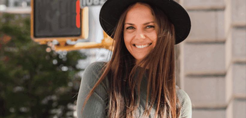 A photo of Hilary Sheinbaum, a New York–based author and journalist, wearing a hat in SoHo.